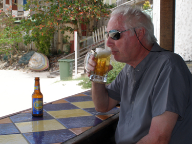 Derek enjoys a beer