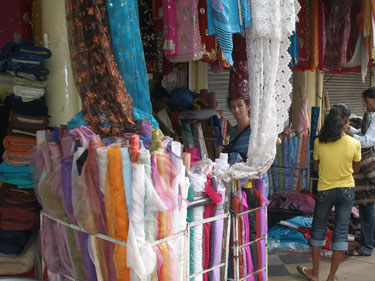 Sheila buying silk